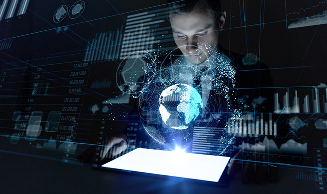 Image of man staring at an electronic globe